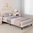 Children's bedroom with a pink bed, nightstand, and decorative wall elements.
