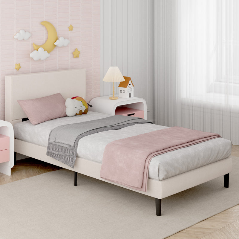 Children's bedroom with a pink bed, nightstand, and decorative wall elements.